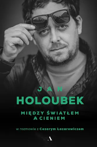 Okładka: Między światłem a cieniem