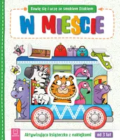 Okładka: Bawię się i uczę ze smokiem Dżokiem. W mieście. Aktywizująca książeczka z naklejkami od 3 lat